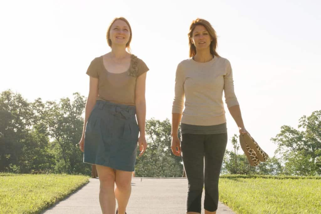 two woman walking