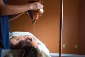 Panchakarma wellness treatment shirodhara at Shankara Ayurveda spa.