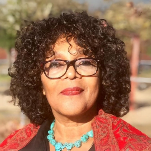 Maya Breuer Headshot Bio 500x500